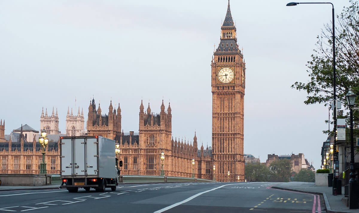 Delivery truck passing over Westminster Bridge, London