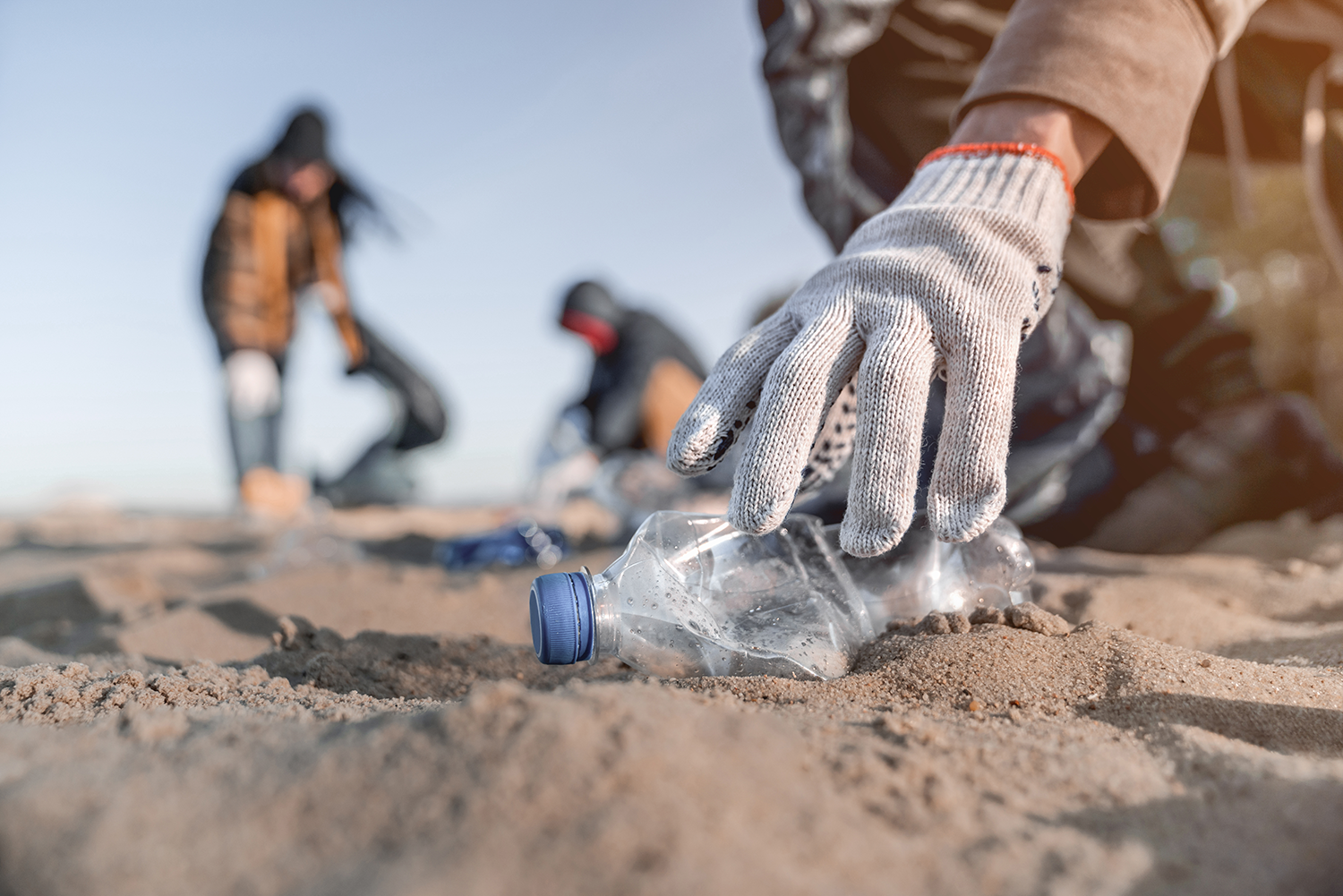 Picking up trash from the beach